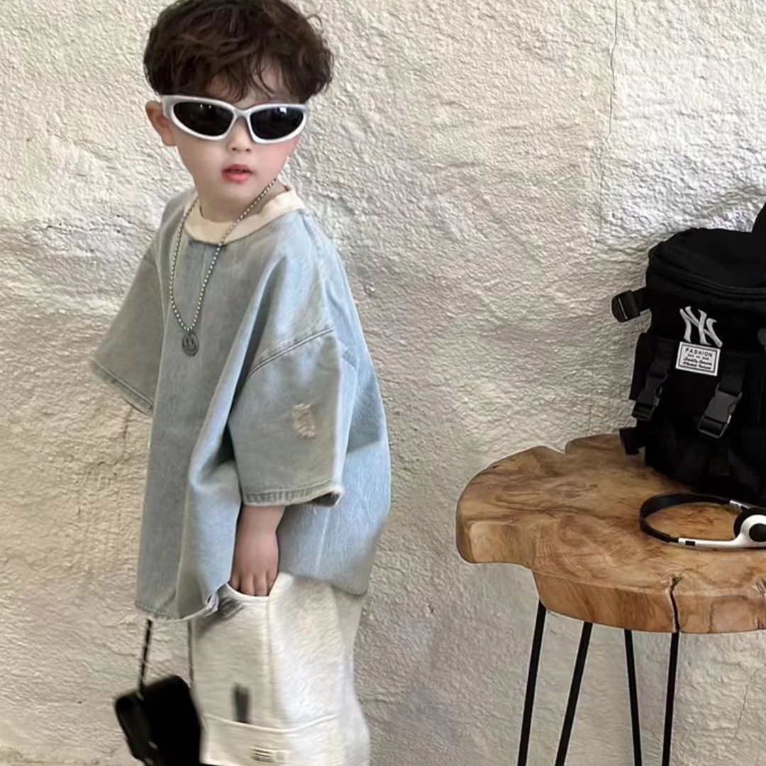 Children's denim short-sleeve top with distinctive ripped design